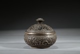 A SILVER 'BUDDHIST' CENSER WITH COVER