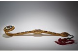 A GILT-BRONZE GEMS MOTHER-OF-PEARL INLAID RUYI SCEPTER