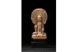 A PAINTED SEATED MARBLE CARVED BODHISATTVA 