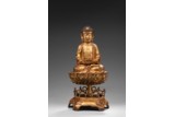 A GILT BRONZE FIGURE OF AMITABHA UPON STAND