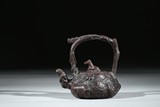A YIXING 'TWELVE ZODIAC' TEAPOT
