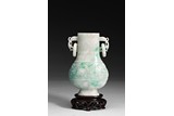 A JADEITE CARVED 'TAOTIE' VASE WITH LOOSE RING HANDLES 