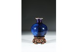 A FLAMBE GLAZED POMEGRANATE-FORM VASE