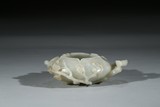 A WHITE JADE 'MAGPIE AND PLUM BLOSSOM' WASHER