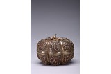 A SILVER REPOUSSE 'HUNDRED BOYS' MELON-SHAPE BOX AND COVER
