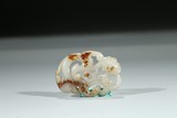A WHITE JADE CARVING OF CHILONG PENDANT