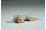 A WHITE JADE CARVED BIXIE
