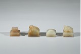 A GROUP OF FOUR JADE SEALS