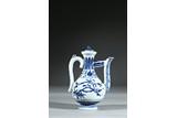 A BLUE AND WHITE 'FLOWERS' TEAPOT AND COVER