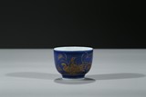 A GILT-DECORATED BLUE GLAZE 'GEESE' CUP