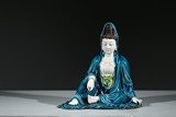 A BLUE GLAZE FIGURE OF GUANYIN