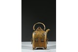 A BRONZE 'SHOU' TEAPOT 