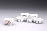 A GROUP OF SIX PORCELAIN CUPS