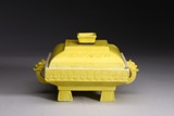 A YELLOW GLAZED ALTAR VESSEL WITH COVER 