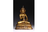 A GILT BRONZE FIGURE OF BODHISATTVA