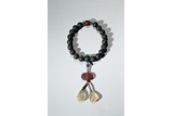 AN AGARWOOD BEAD BRACELET 