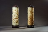 A PAIR OF JADE CARVED 'FIGURES AND LANDSCAPE' INCENSE HOLDERS