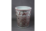 A LARGE UNDERGLAZE RED 'MYTHICAL BEAST' JARDINIERE