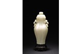 A WHITE JADE LOBED VASE AND COVER WITH ZITAN STAND