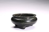 A SPINACH GREEN JADE CARVED TRIPOD CENSER 