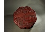 A LACQUERED CARVED 'SCHOLARS' LOBED BOX 