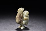 A CELADON JADE 'CHILD AND ROOSTER'