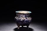 A FLAMBE-GLAZED TRIPOD CENSER