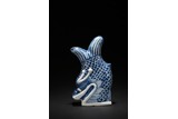 A BLUE AND WHITE PORCELAIN ROOF TILE FISH WITH DRAGON HEAD
