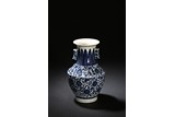 A WHITE AND BLUE 'FLOWER' VASE