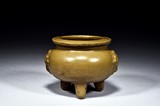 A TEA-DUST GLAZED TRIPOD CENSER