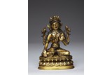 A GILT-BRONZE FIGURE OF AVALOKITESHVARA