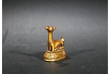 A GILT BRONZE STATUE OF DEER