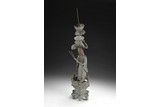 A CHINESE TAOIST FIGURE PEWTER CANDLESTICK HOLDER