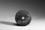 AN ARCHAIC JADE DISC