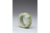 A JADEITE CARVED BRACELET