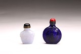 A SET OF TWO GLASS SNUFF BOTTLES