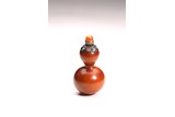 A GOURD CARVED SNUFF BOTTLE