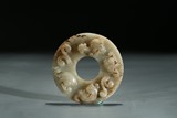 A WHITE AND RUSSET JADE 'CHILONG' BI DISC