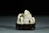 A CHINESE WHITE JADE CARVED LAUGHING BUDDHA