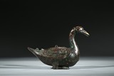 AN ARCHAISTIC BRONZE GOLD AND SILVER INLAID DUCK-FORM CENSER
