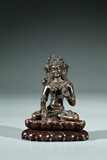 A COPPER ALLOY FIGURE OF TARA