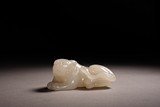 A CHINESE WHITE JADE TIGER PAPER WEIGHT