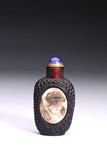 A GLASS MOTHER-OF-PEARL 'FIGURE' SNUFF BOTTLE