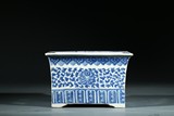 A CHINESE BLUE AND WHITE JARDINIERE