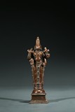 A COPPER ALLOY FIGURE OF STANDING SHIVA