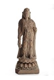 A STONE CARVING OF STANDING BODHISATTVA