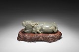 A CELADON JADE BUFFALO AND BOY GROUP