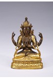 A GILT-BRONZE FIGURE OF FOUR-ARMED BODHISATTVA