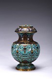 A CLOISONNE ENAMEL 'TAOTIE' FLOWER RECEPTACLE VASE