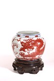 A CHINESE UNDERGLAZE RED 'DRAGON' JAR